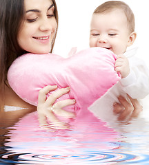 Image showing baby and mama with heart-shaped pillow