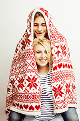 Image showing young pretty teenage couple, hipster guy with his girlfriend happy smiling and hugging isolated on white background, lifestyle people concept, valentine design winter plaid