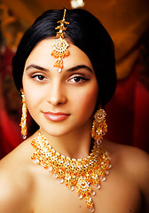 Image showing beauty sweet real indian girl in sari smiling on black backgroun