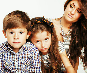 Image showing young mother with two children on white, happy smiling family in