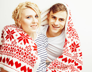 Image showing young pretty teenage couple, hipster guy with his girlfriend happy smiling and hugging isolated on white background, lifestyle people concept, valentine design winter plaid