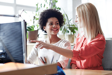 Image showing happy women or students with computer in office