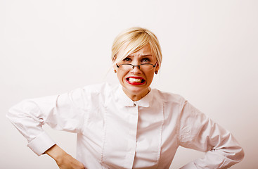 Image showing very emotional businesswoman in glasses, blond hair on white bac