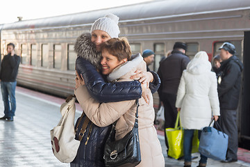 Image showing Adult daughter met my mother at the train at the station