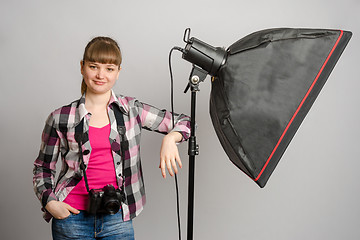 Image showing Portrait of a girl the photographer at the studio softbox