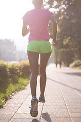 Image showing african american woman jogging in the city