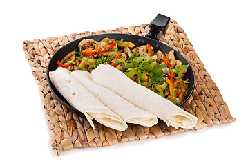 Image showing traditional mexican beef fajitas with tortillas