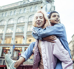 Image showing Two teenage girls infront of university building smiling, having fun traveling europe, lifestyle people concept
