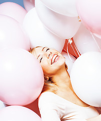 Image showing young happy blonde real woman with baloons smiling close up, lifestyle people concept