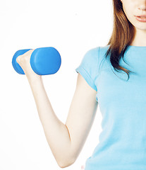 Image showing young pretty slim womans hand with dumbbell isolated, real sport girl next door, lifestyle people concept