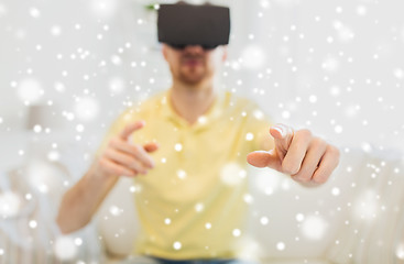 Image showing young man in virtual reality headset or 3d glasses