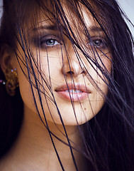 Image showing beauty young brunette sad woman close up,real spa