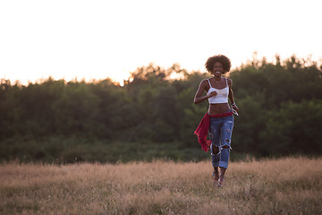 Image showing young black woman in nature