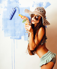 Image showing cute bright woman in sunglasses and hat with cocktail in bikini 