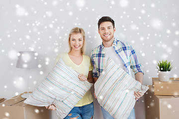 Image showing happy couple with stuff moving to new home