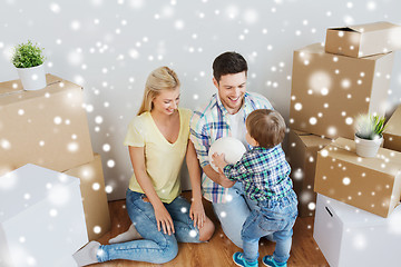 Image showing happy family moving to new home and playing ball