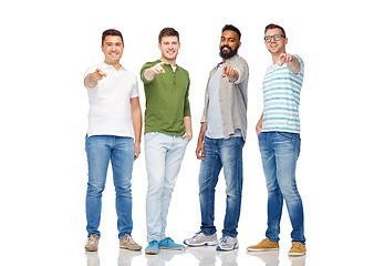 Image showing happy smiling men pointing finger to you