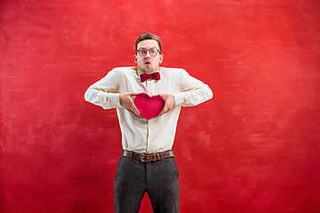 Image showing Young beautiful man with abstract heart