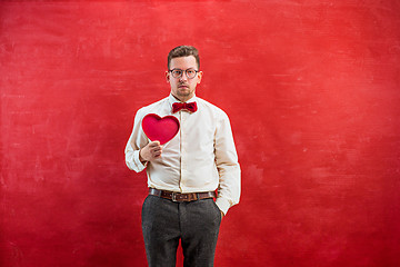 Image showing Young beautiful man with abstract heart