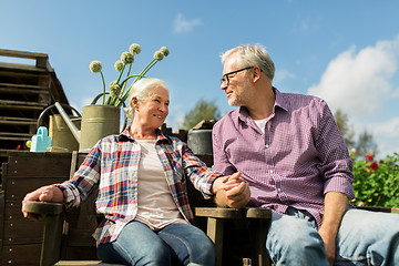 Image showing happy senior couple at summer farm