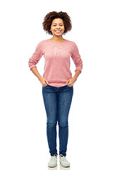 Image showing happy african american young woman over white