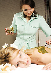 Image showing stock photo attractive lady getting spa treatment in salon, massage doctor smiling care pretty