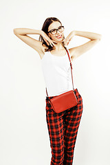 Image showing young happy smiling latin american teenage girl emotional posing on white background, lifestyle people concept, school uniform wearing glasses