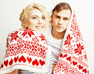 Image showing young pretty teenage couple, hipster guy with his girlfriend happy smiling and hugging isolated on white background, lifestyle people concept, valentine design winter plaid