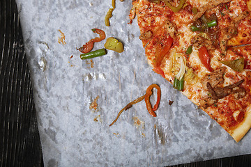 Image showing Homemade pizza on a wooden table