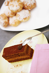 Image showing Chocolate cake and eclairs