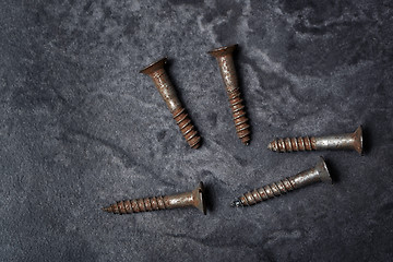 Image showing Group of rusty screws