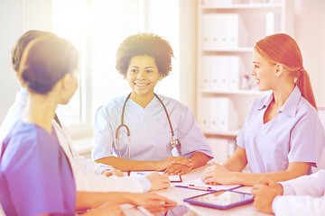 Image showing group of happy doctors meeting at hospital office