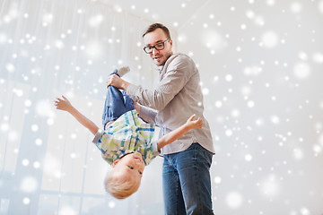 Image showing father with son playing and having fun at home