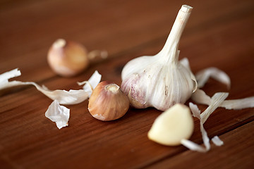 Image showing close up of garlic on wooden table
