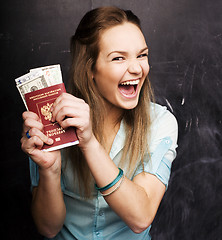 Image showing portrait of cute girl student with money and passport