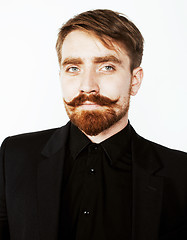 Image showing young red hair man with beard and mustache in black suit on whit