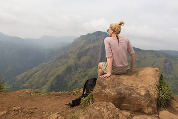 Image showing Female tourist enjoying beautiful view of tea plantations, Sri Lanka.