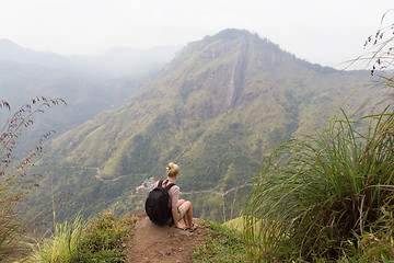 Image showing Female tourist enjoying beautiful view of tea plantations, Sri Lanka.