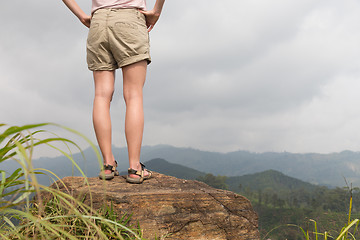 Image showing Female tourist enjoying beautiful view of tea plantations, Sri Lanka.