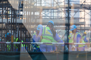 Image showing Team of construction worker on construction site.