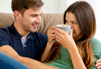 Image showing Young couple drinking coffee