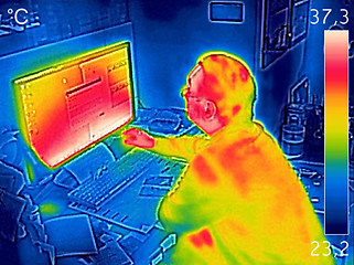 Image showing Infrared thermal image showing the heat emission while a man wor