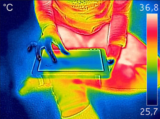 Image showing Infrared thermal image showing the heat emission while young wom