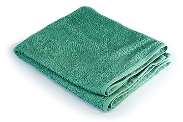 Image showing green towel over white