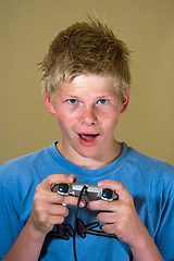 Image showing Boy playing a video game