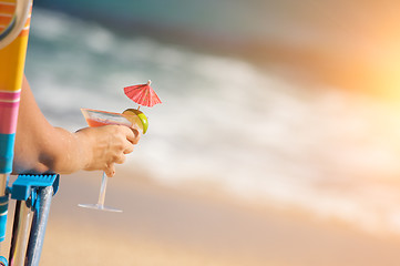 Image showing Woman on Beach with Tropical Drink