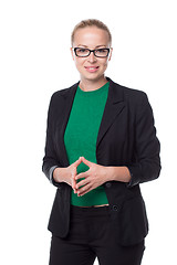 Image showing Business woman standing with arms crossed against white background..