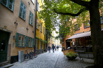 Image showing STOCKHOLM, SWEDEN - AUGUST 19, 2016: View of narrow street and c