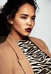 Image showing beauty young afro woman in zebra print sweater close up, sexy winter look, fashion make up