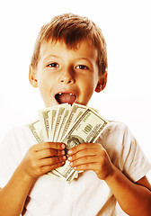 Image showing young cute boy holding lot of cash, american dollars isolated